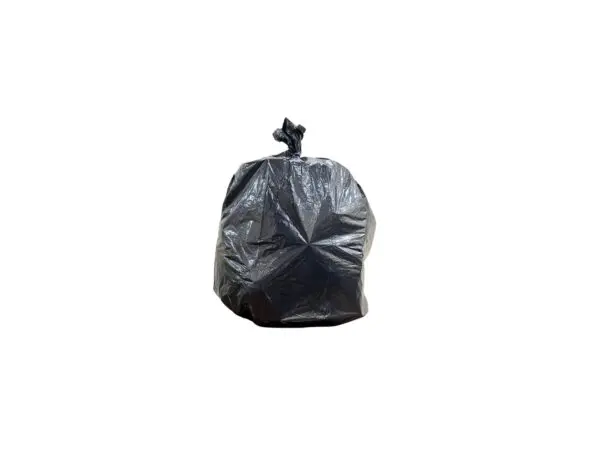 Black bag filled with trash on display