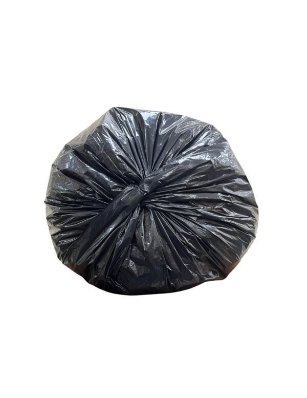 A black bag filled with trash on white background