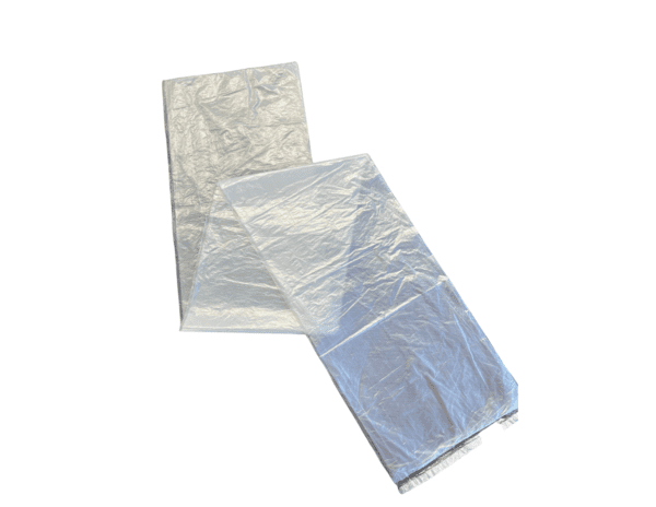 Folded transparent trash bag on white background